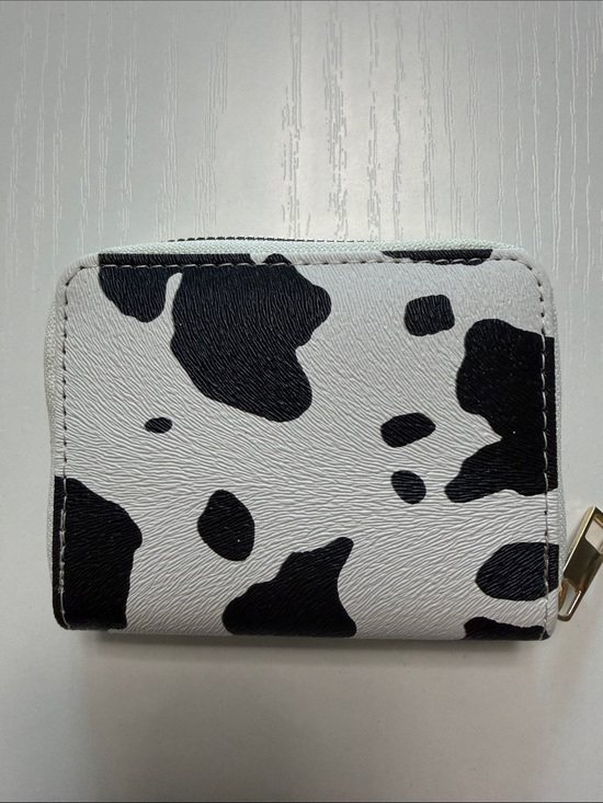 Handbags - NWOT Cow Print Zip Wallet in Black and White